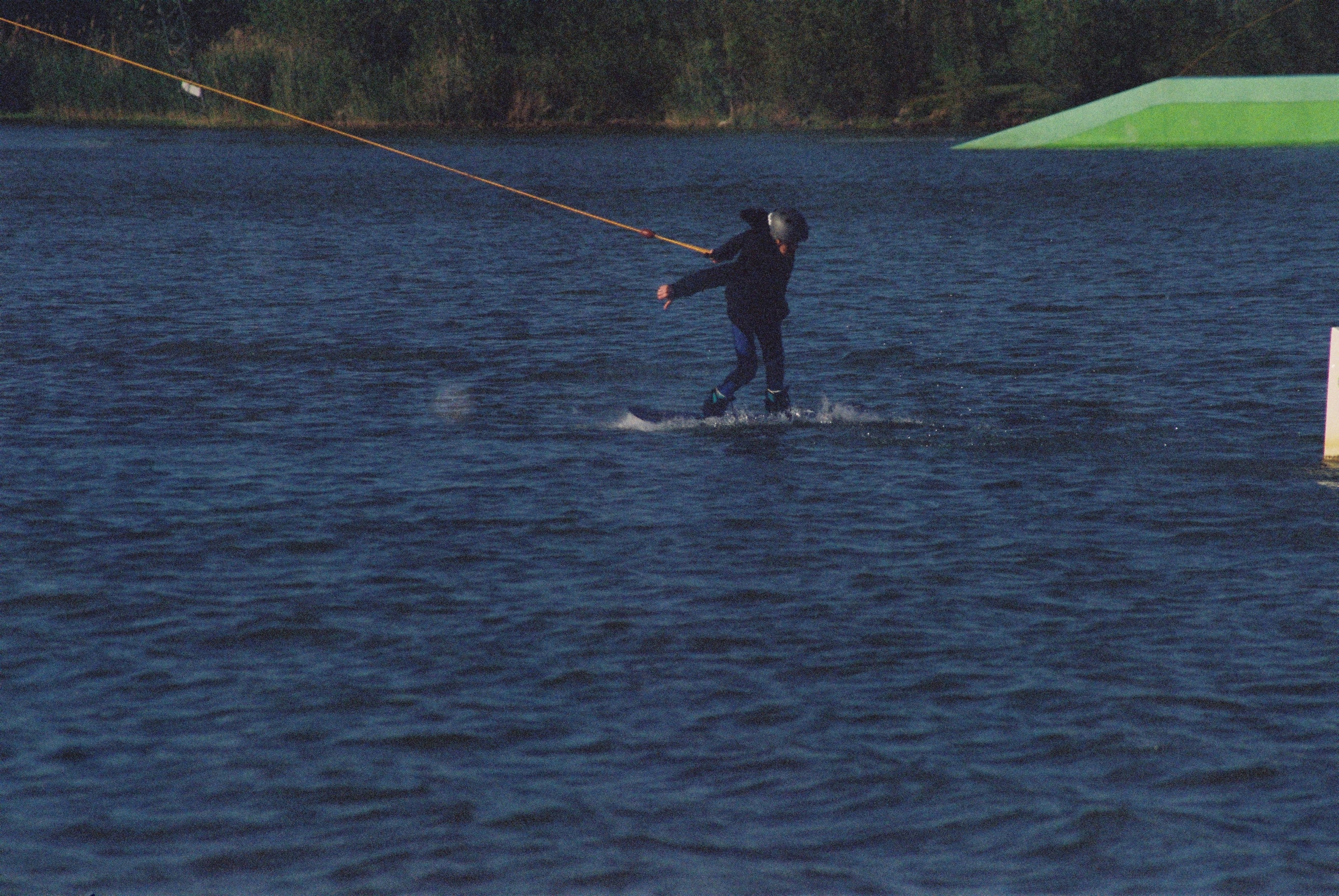 a man kite surfing on the water